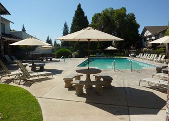 Poolside Relaxing Area at Scottsmen Apartments, Clovis, 93612